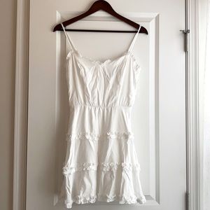 White flowy short dress. Never worn, tag still on. Purchased from Francesca’s.